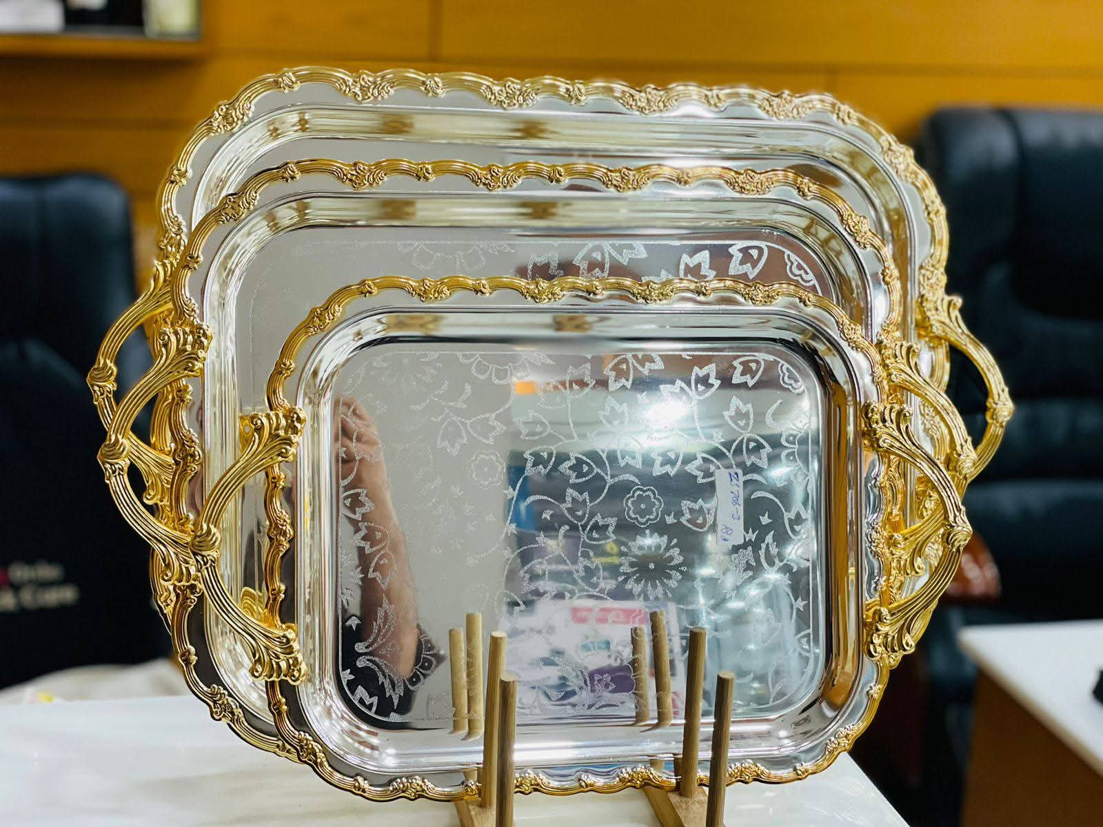 Luxurious 3-piece golden tray set perfect for serving, decoration, and special occasions.