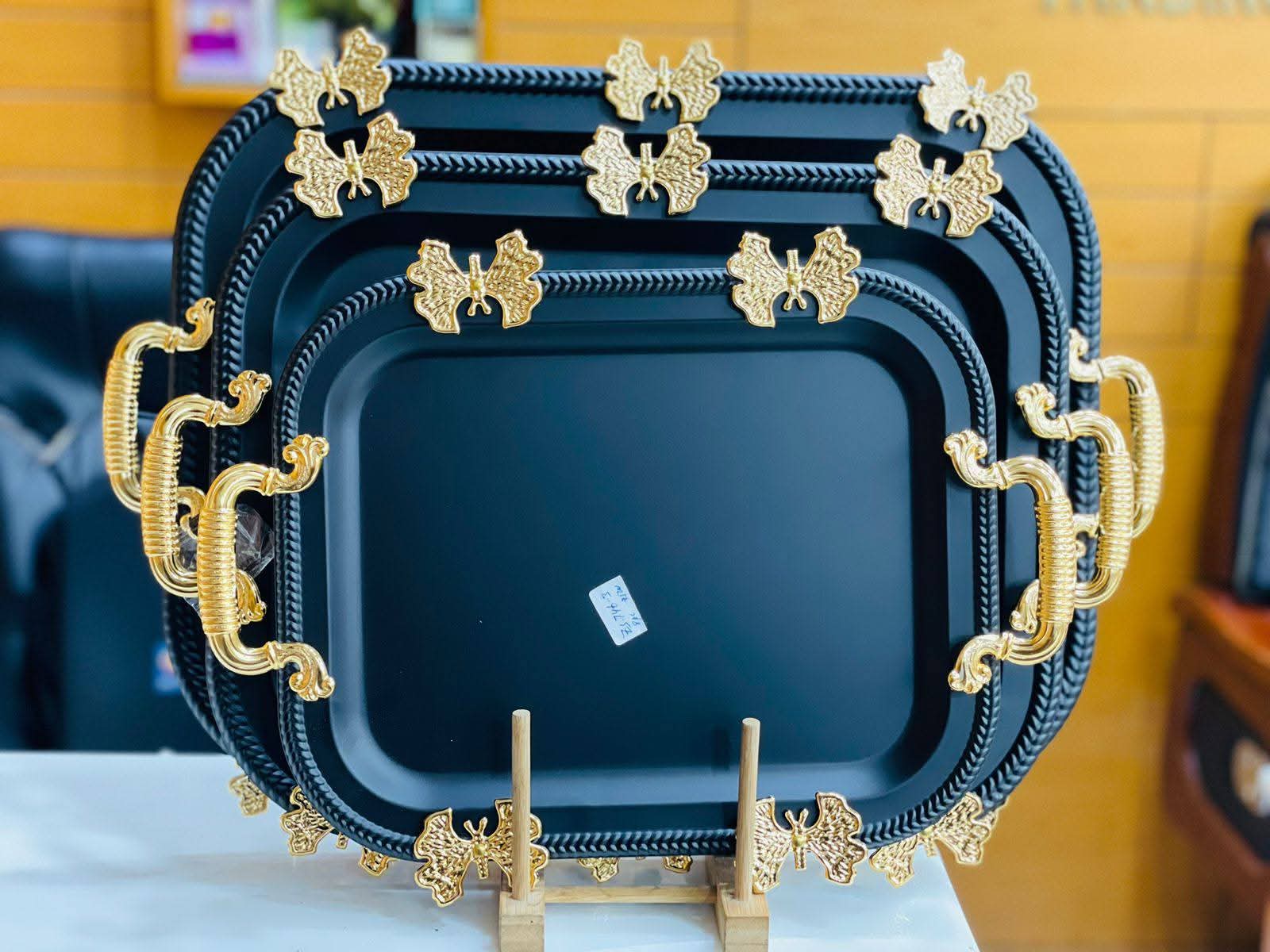 Luxurious 3-piece golden tray set perfect for serving, decoration, and special occasions.