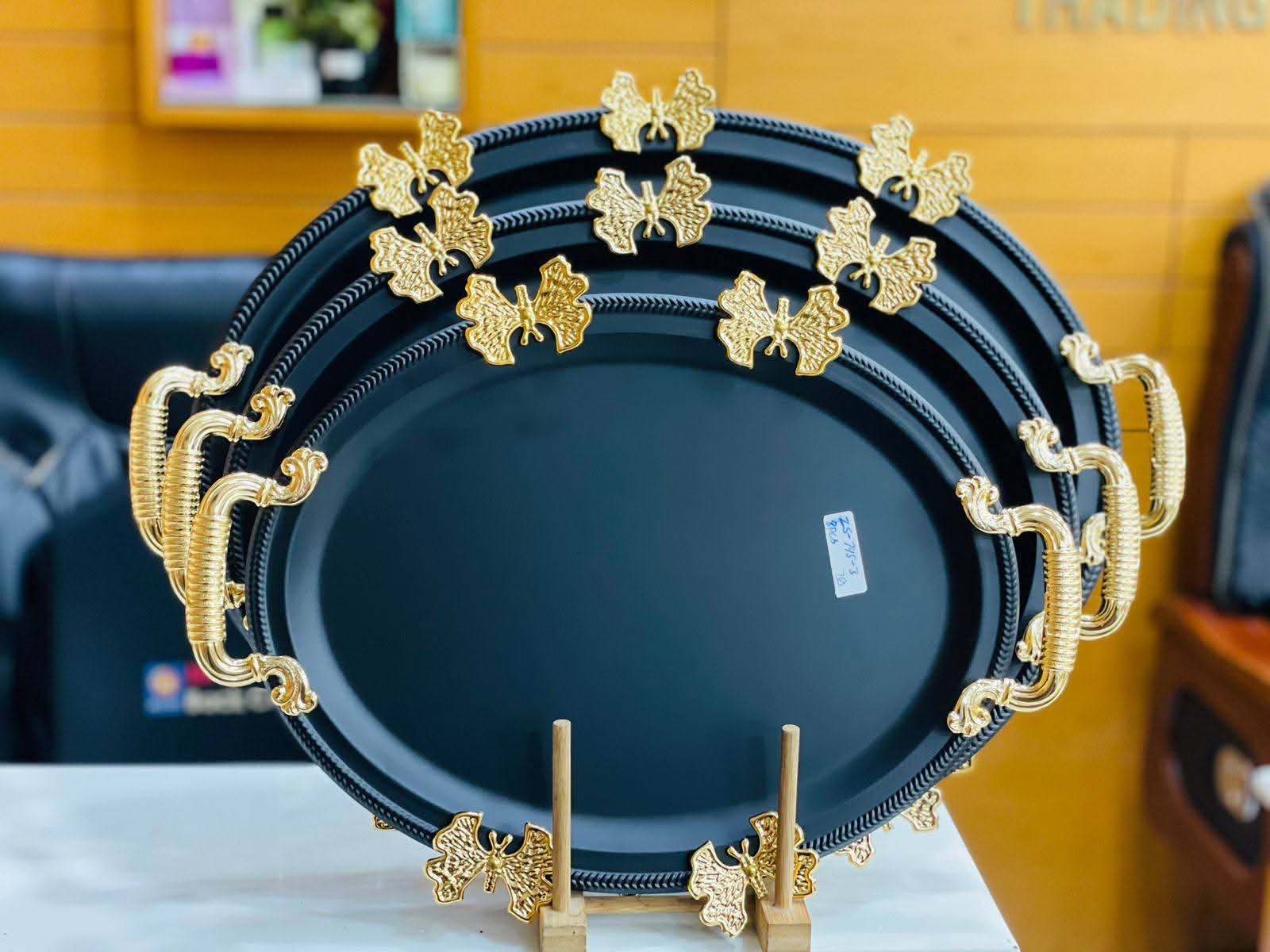 Luxurious 3-piece golden tray set perfect for serving, decoration, and special occasions.